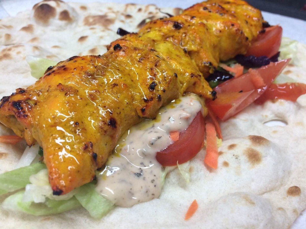 A skewer of chicken fillet marinated in yoghurt and saffron for 24 hours.