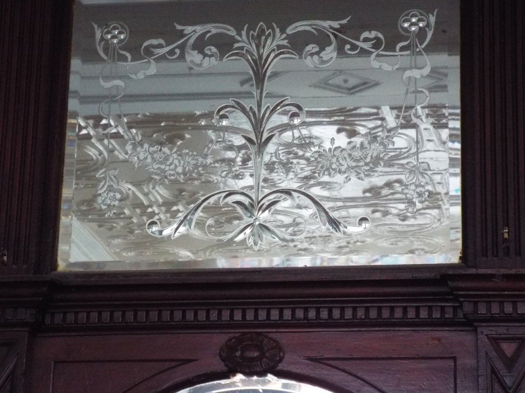 Original etched glass is going to set the restored street-level bar room off a treat