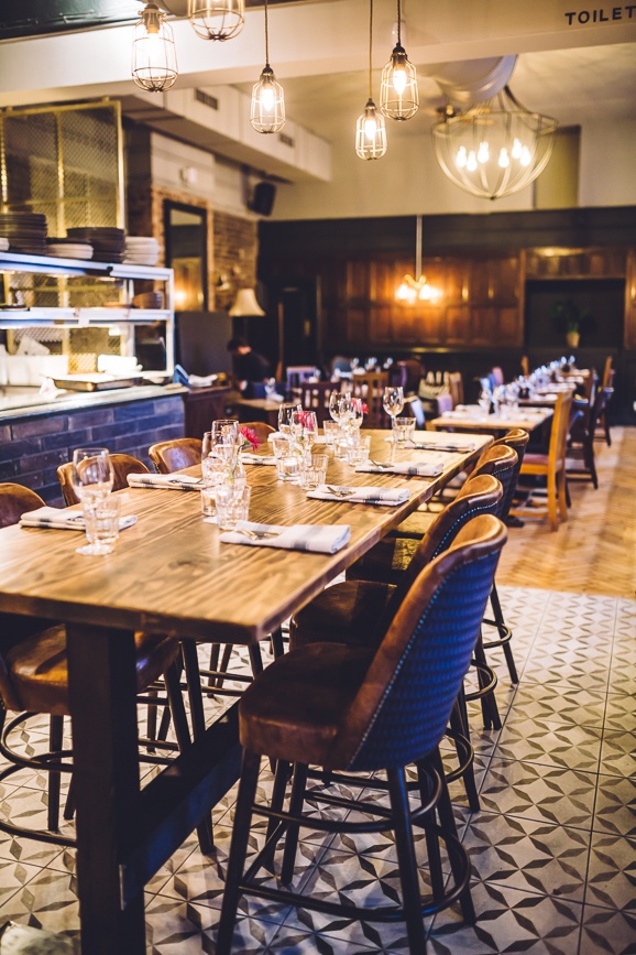 The sharing table in front of the open kitchen. Photo: Unleashed